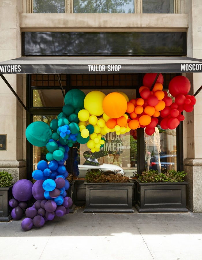 Todd Snyder store front with large colorful balloon display